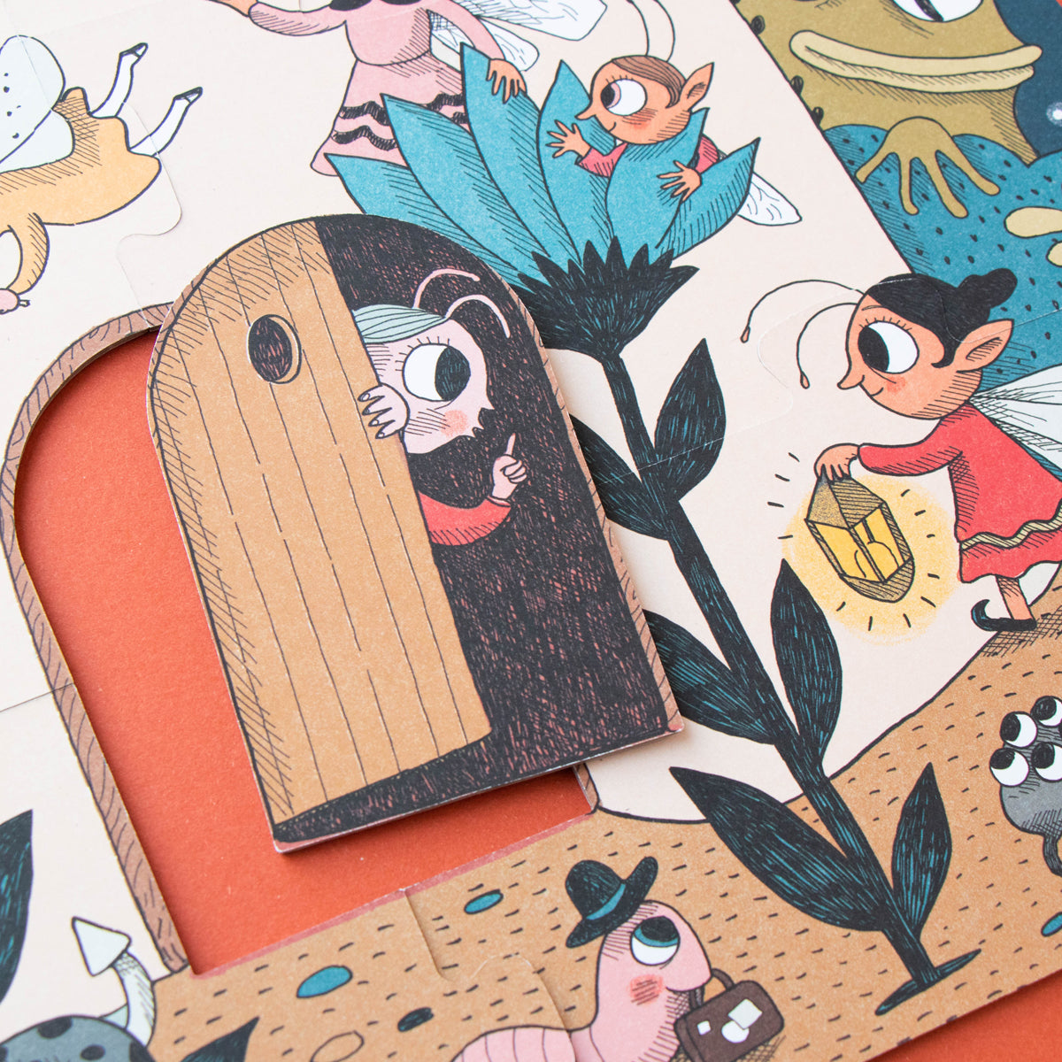 Elf peeking out from behind a wooden door in the puzzle