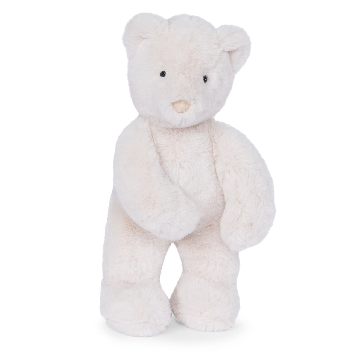 A fluffy, cream-colored teddy bear standing upright against a white background with small black eyes and a tan nose.
