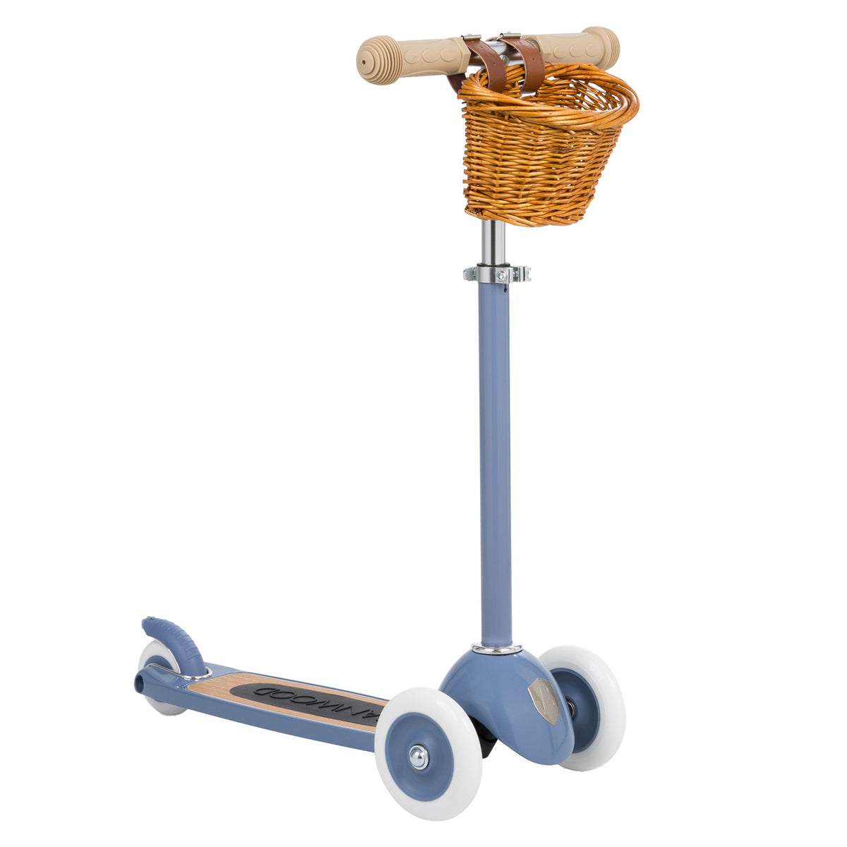 Banwood kids scooter in blue with wicker basket and leather strap attached to wooden T-bar handles on white background.