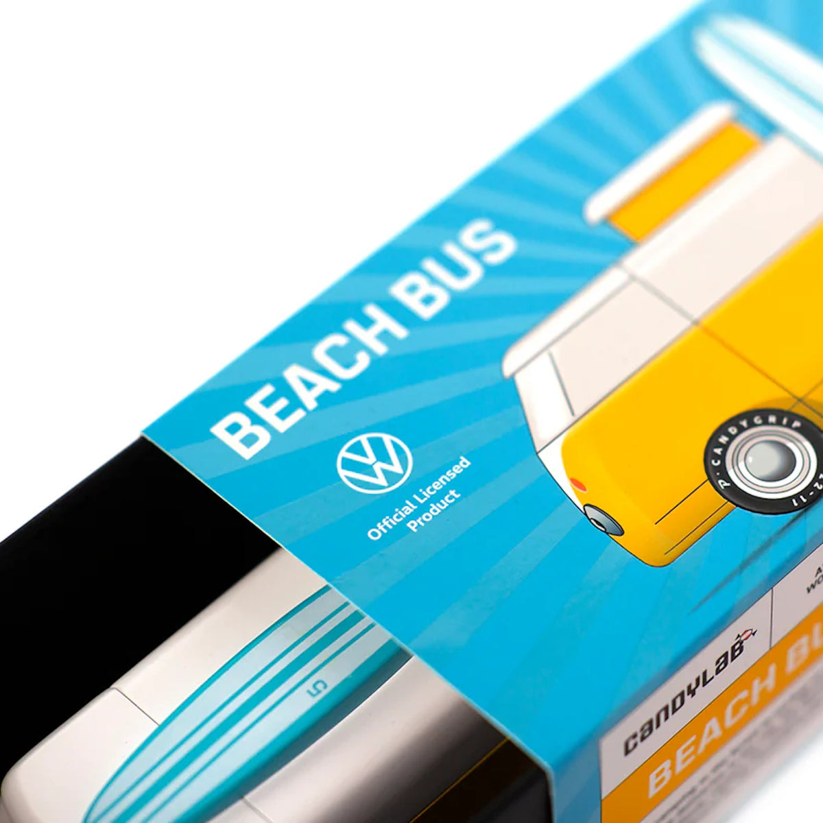 Candylab Beach Bus VW official licensed product packaging sleeve showing the toy camper and surfboard inside.