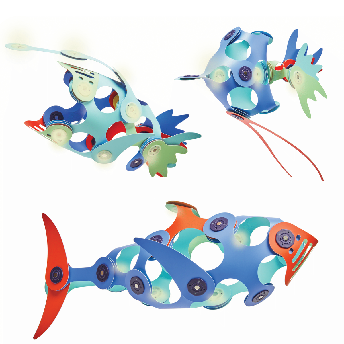 Three colorful ocean creatures built from flexible magnetic toy pieces against a white background.