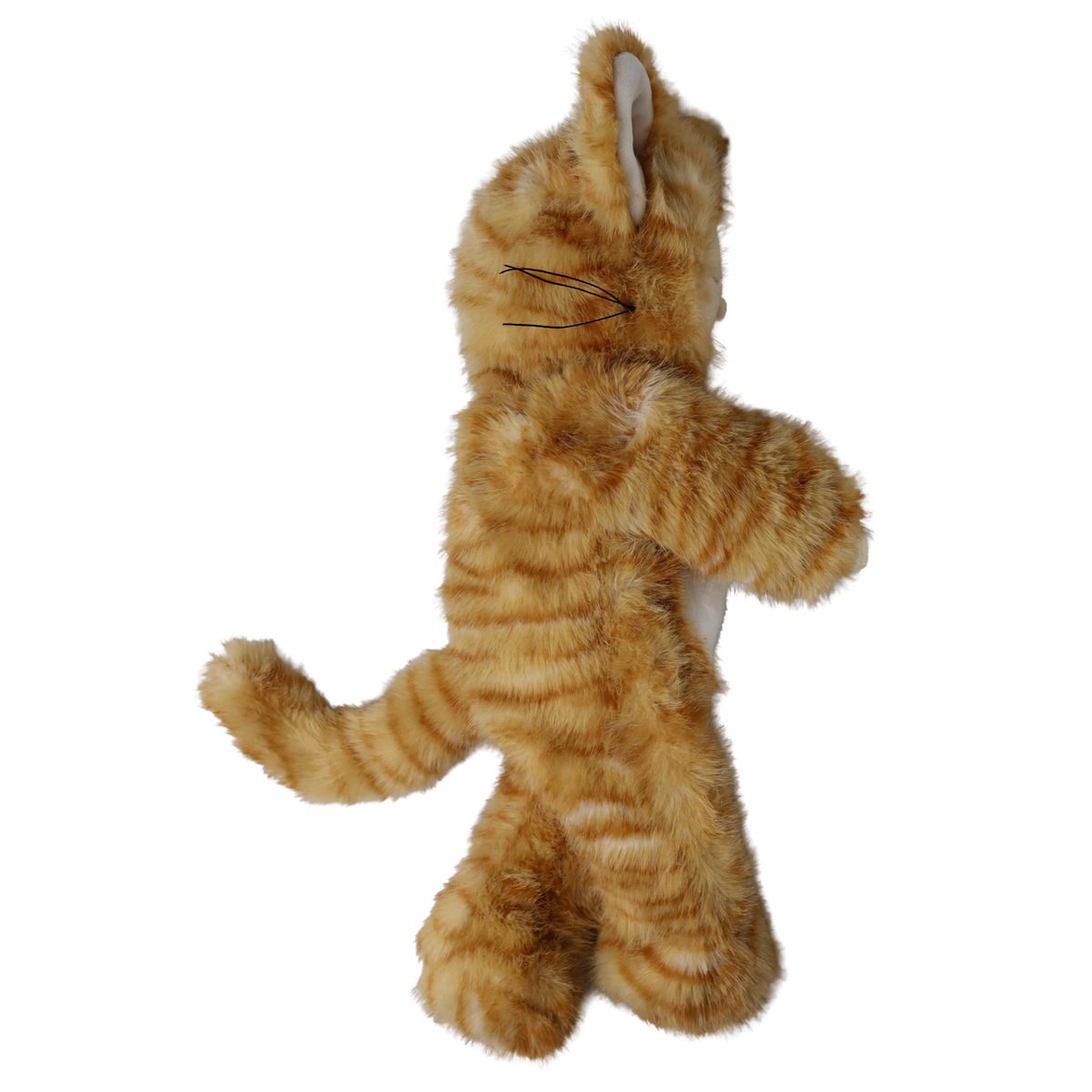 Profile view of plush doll in a fuzzy orange tabby cat suit showing whiskers and tail.