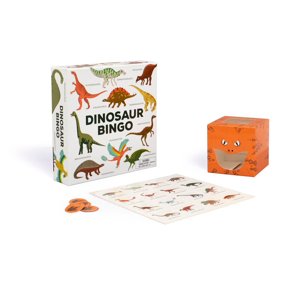 Dinosaur Bingo game set features a colorful box with various dinosaur illustrations, an orange dinosaur-themed card dispenser, a bingo card, and tokens. Fun and educational.