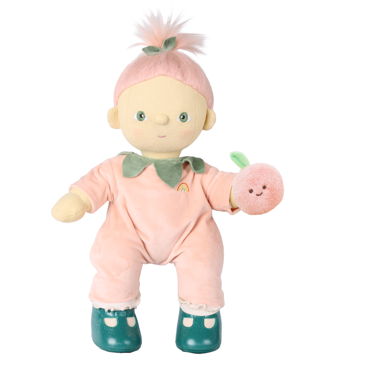 Olli Ella Cozy Dinkum Doll Piper Peach in a peach velour suit holding a plush peach rattle.