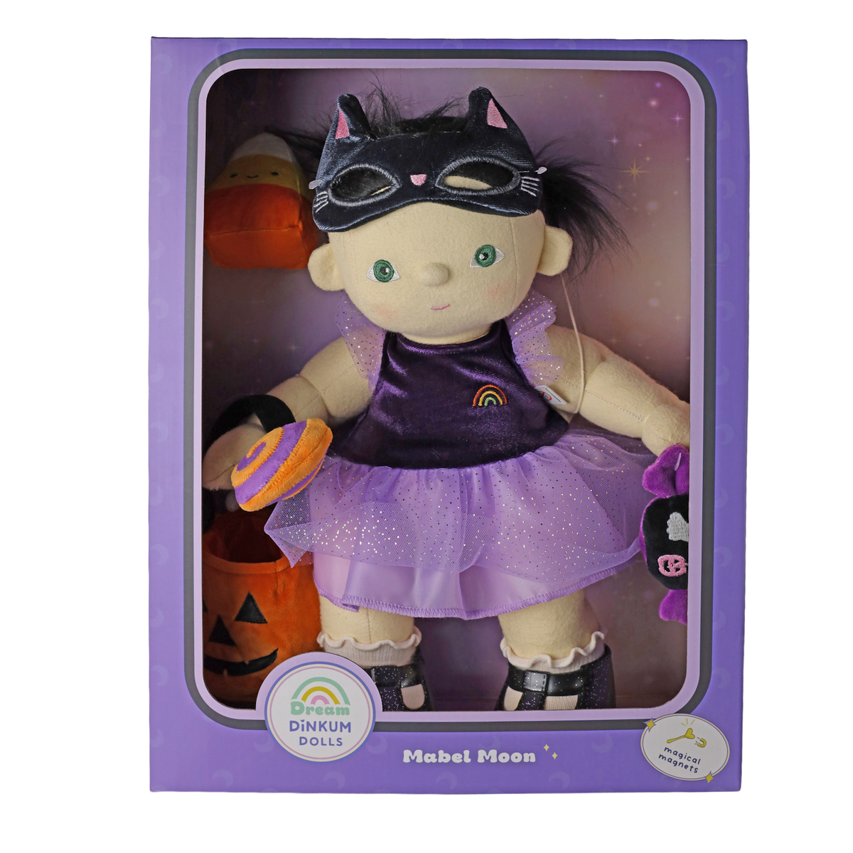 Plush doll dressed in a cat mask and purple outfit inside its original product packaging.