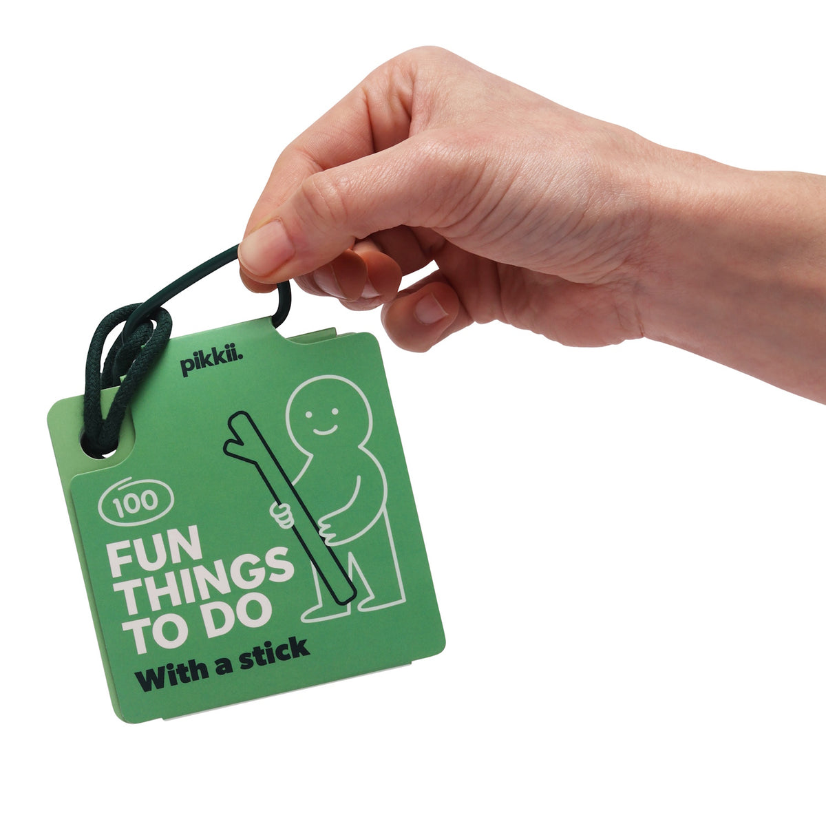 Hand holding green card deck titled "100 Fun Things To Do With a stick" attached to a cord.