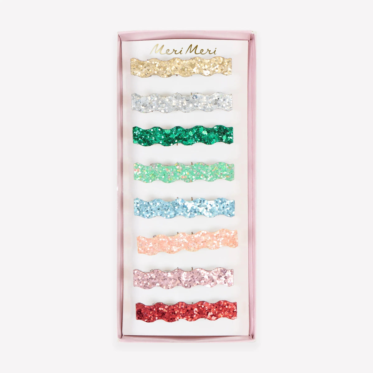 Meri Meri wavy glitter hair clips set packaging in an array of colorful shades.