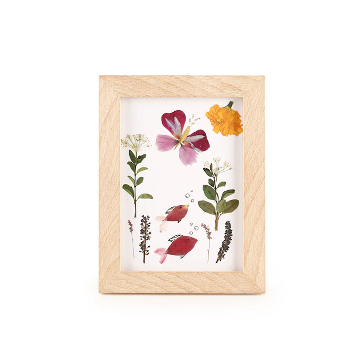 Huckleberry pressed flower art kit in natural wood frame with dried botanicals arranged as fish and butterfly.