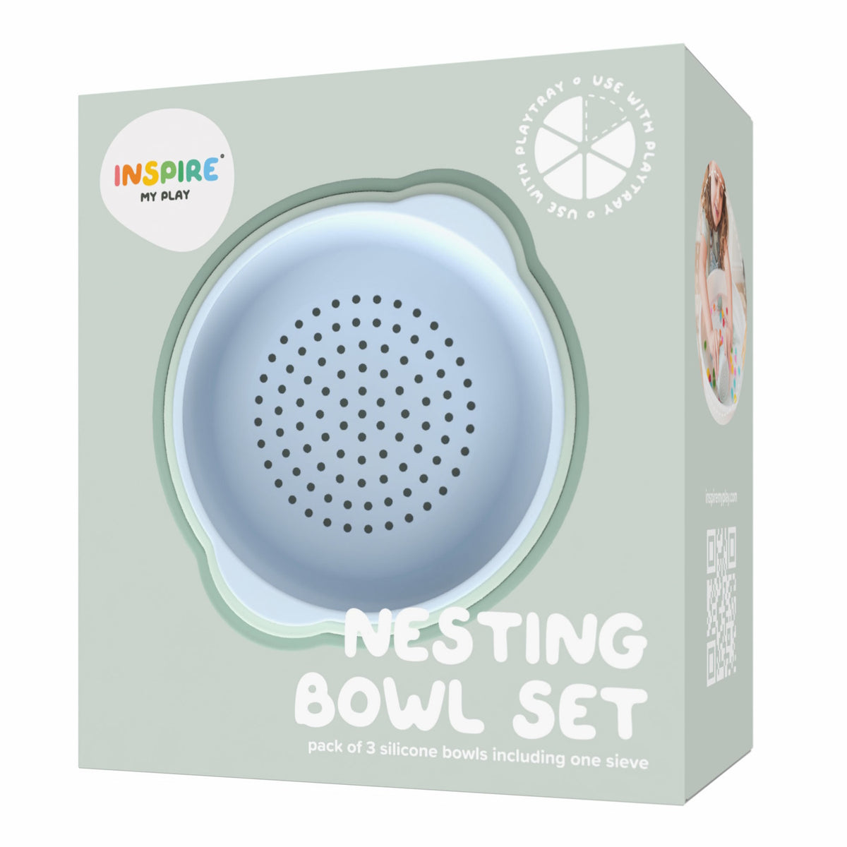 Packaging for a "Nesting Bowl Set" with a cute, pastel blue silicone sieve visible. Labeled for use with play products, the design is playful and modern.