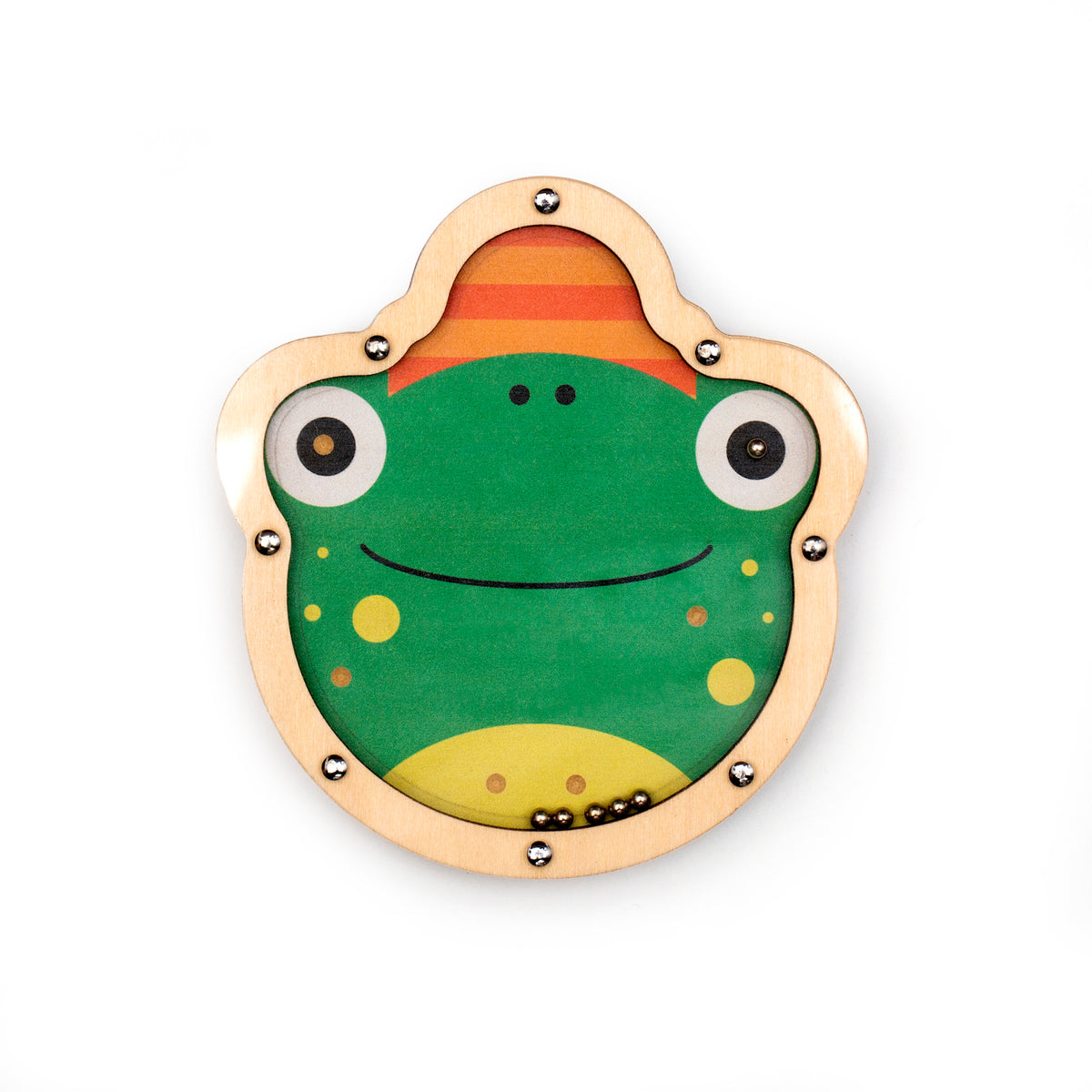 Cute frog illustration on a round, wooden toy with metal balls inside. The frog is green with big eyes, yellow spots, and a friendly smile.