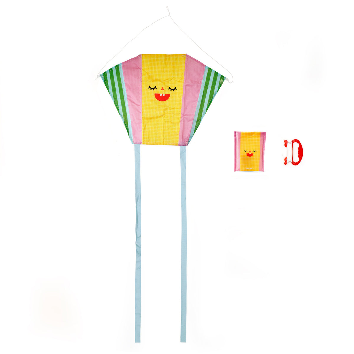 Colorful kite with a smiling face, featuring pink, yellow, and green stripes and long blue tails. A red handle and matching pouch are shown. Playful and cheerful tone.
