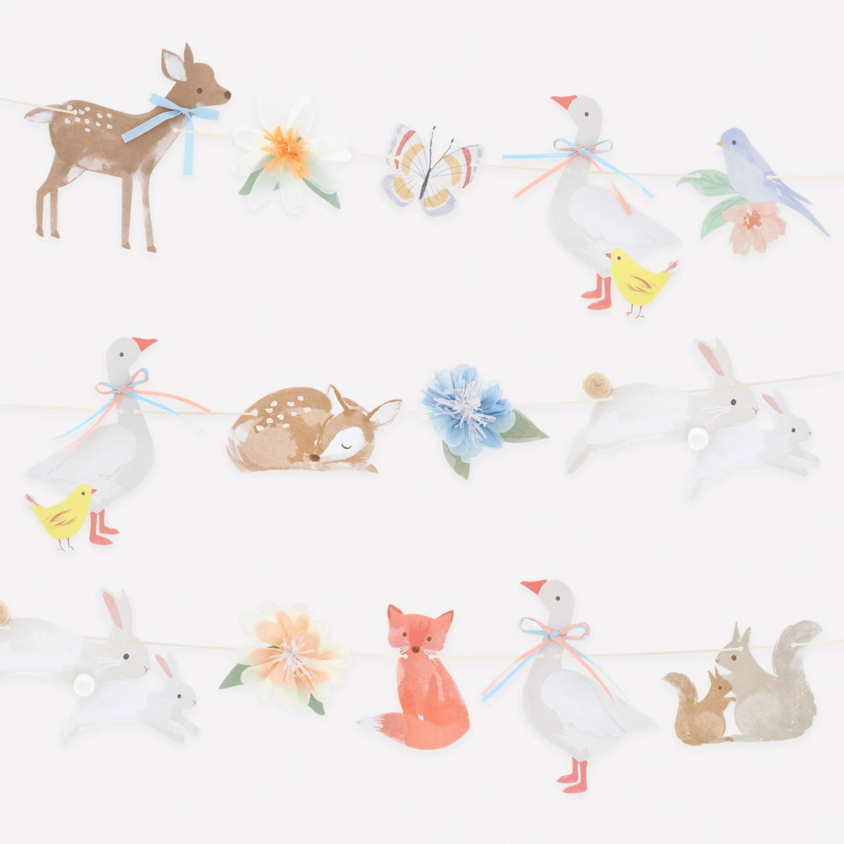 Watercolor woodland animal garland featuring deer, geese, rabbits, a fox, and squirrels on strings.