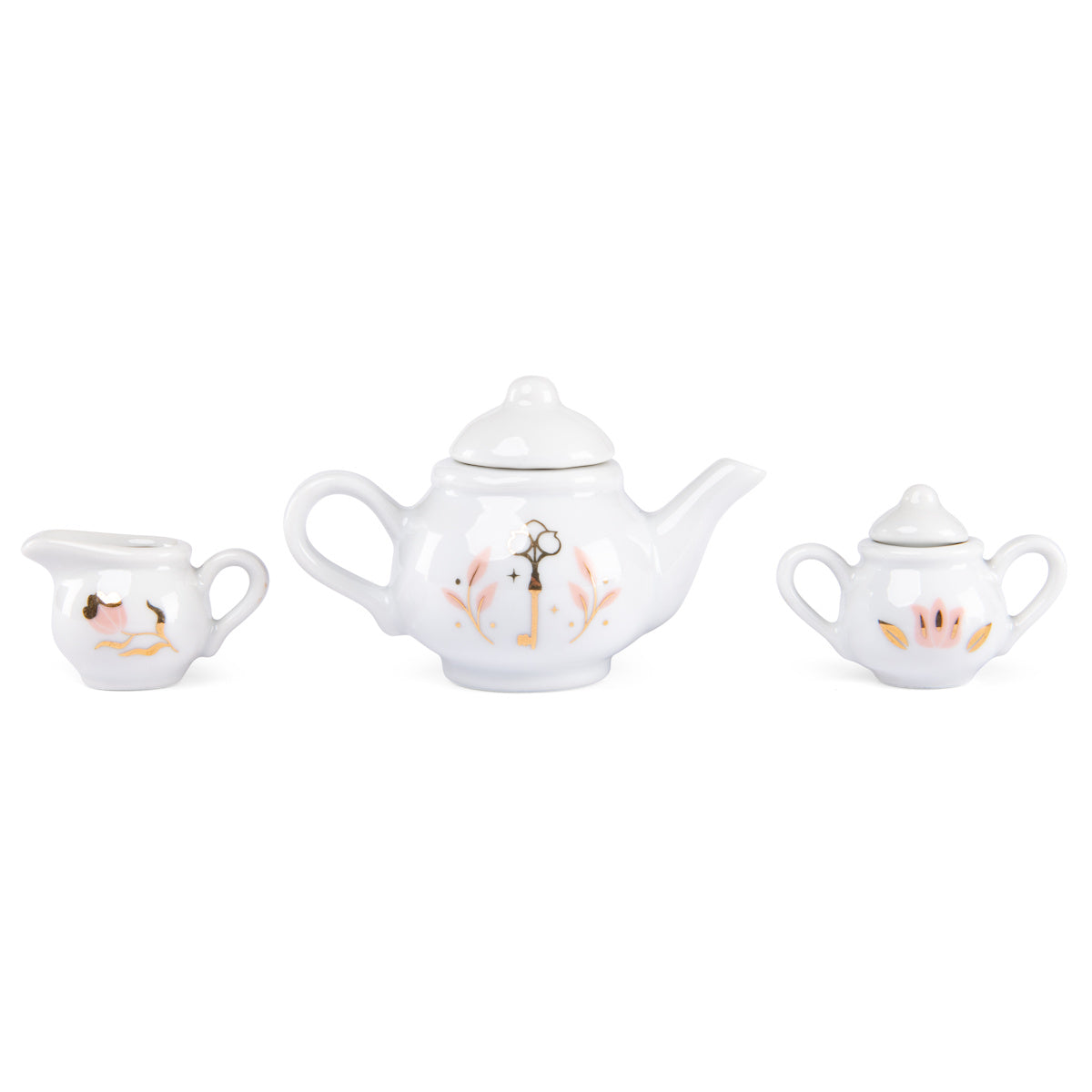 White ceramic miniature toy tea set with pink and gold key floral designs.