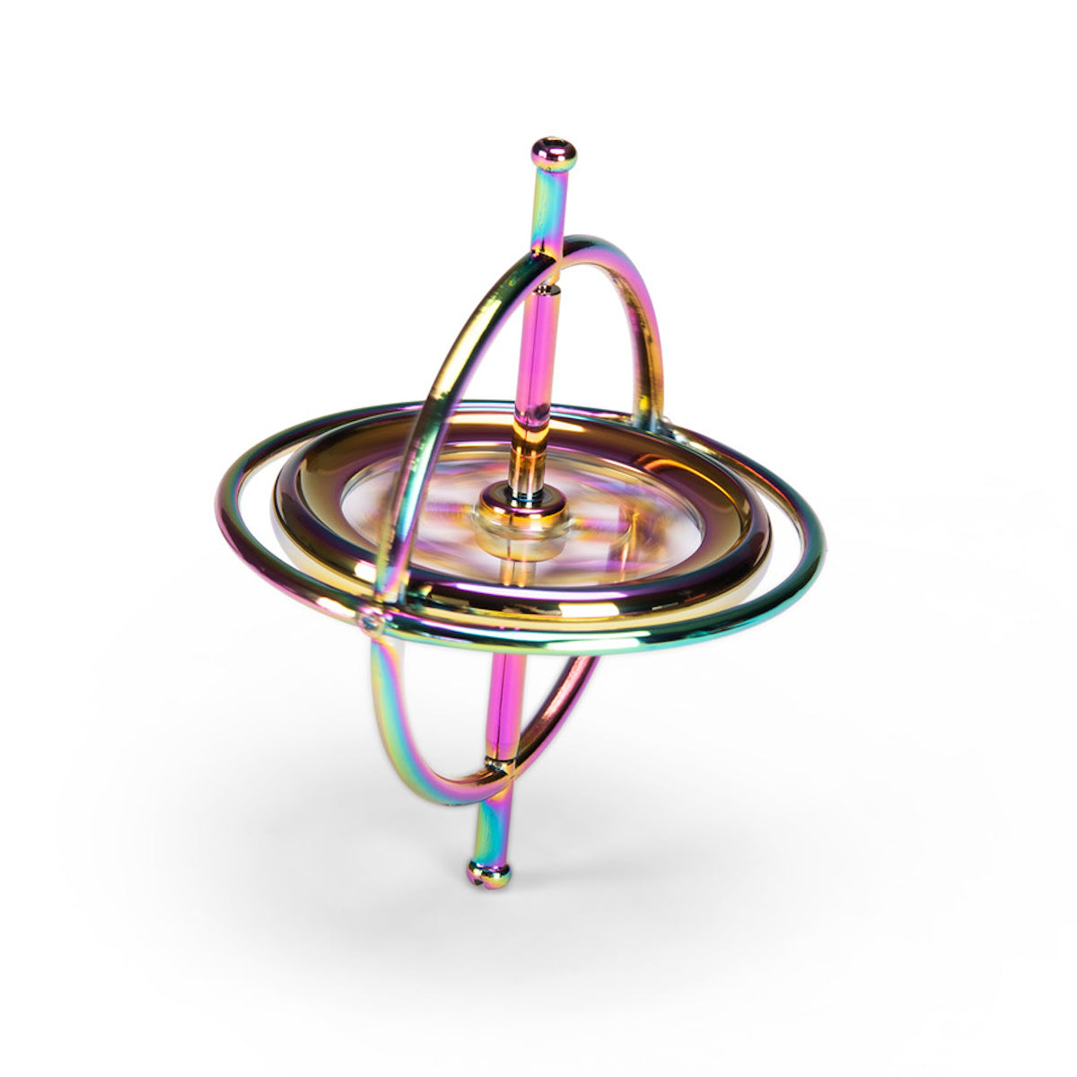 Rainbow metal gyroscope spinning top toy balanced on a white background.