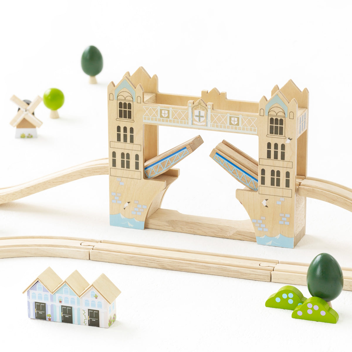 Wooden Tower Bridge set with drawbridge open, tracks, small buildings, and mini trees.