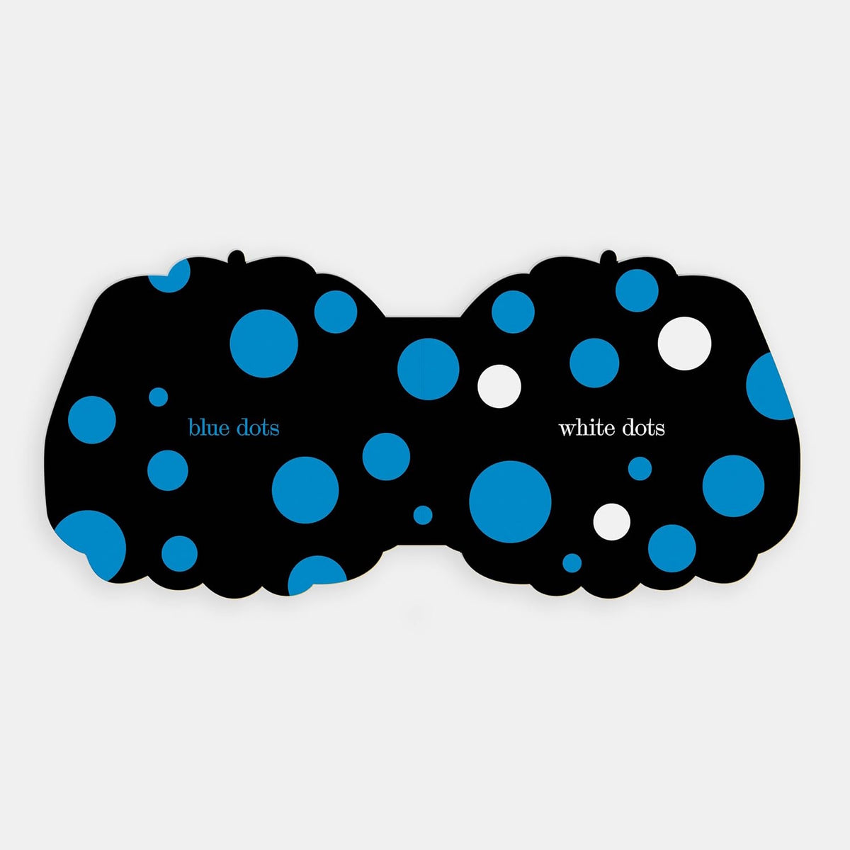 Shaped board book spread showing "blue dots" on black opposite "white dots" interspersed with blue ones.