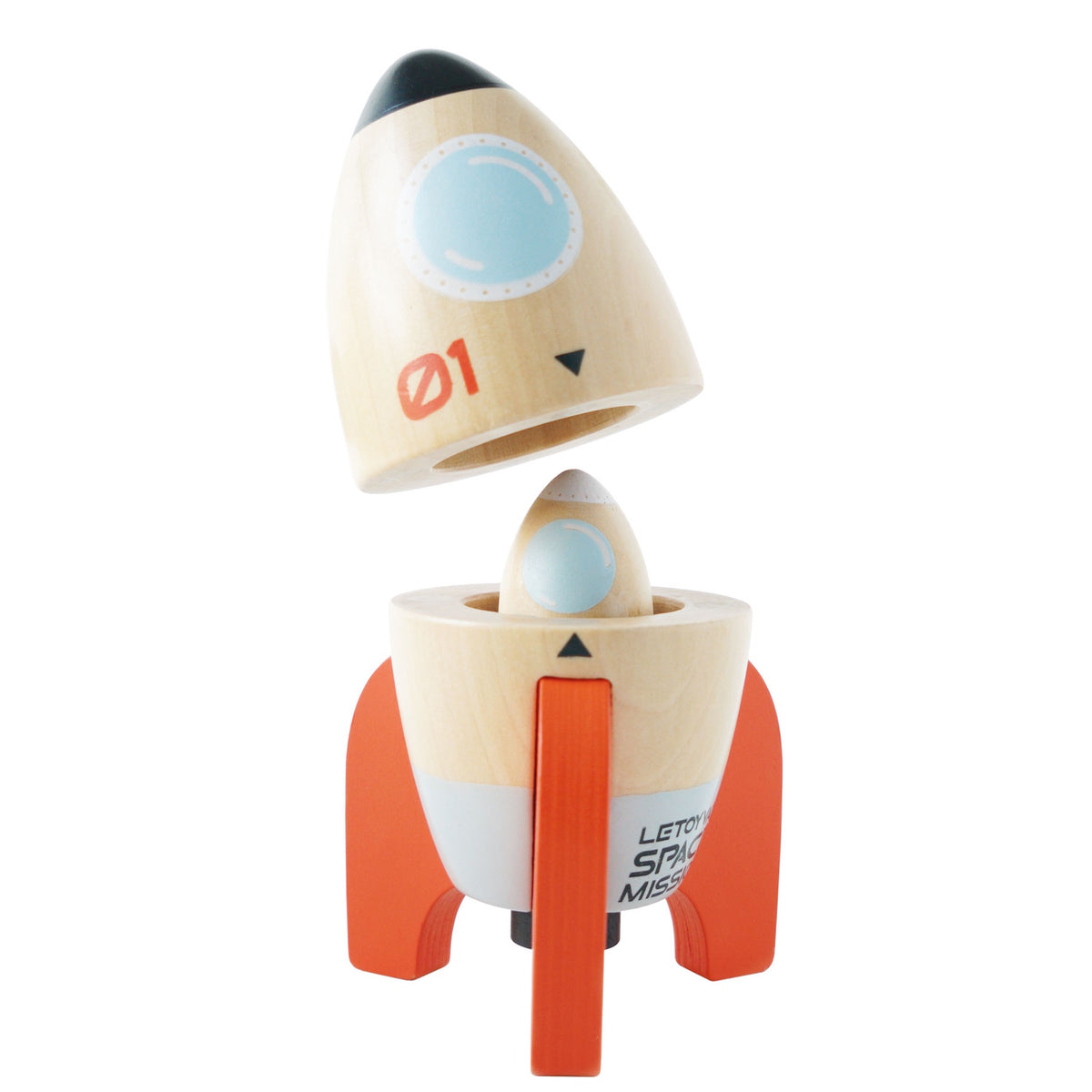 Wooden toy rocket top lifted, revealing a smaller wooden rocket nestled inside the lower stage.