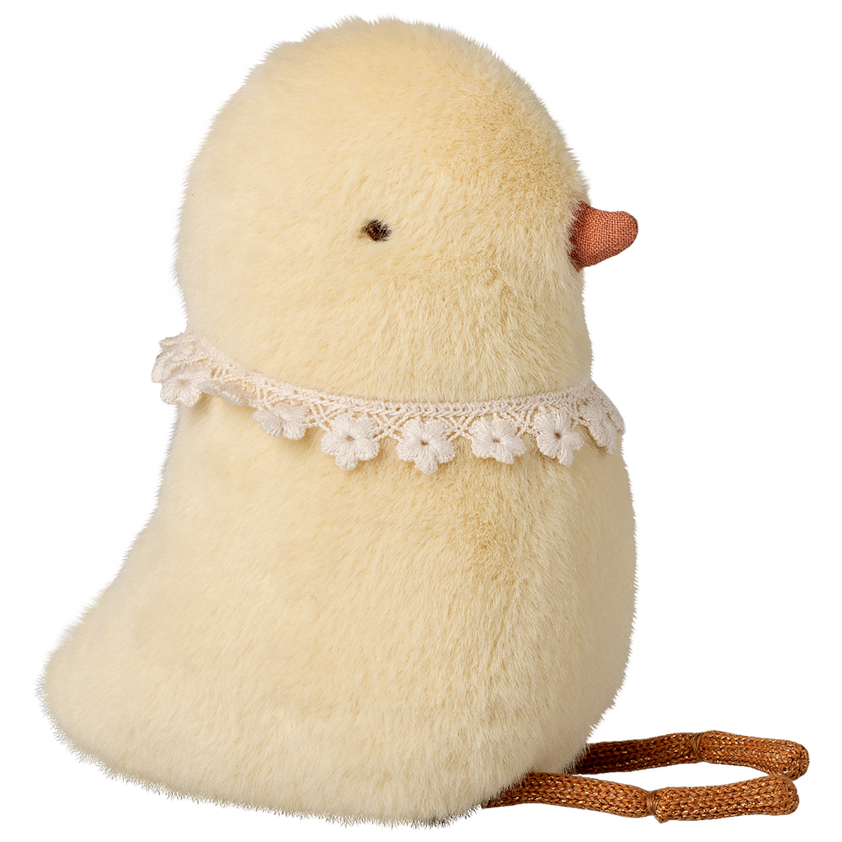 Fluffy yellow chick plush with small orange beak and lace flower collar, on a white background. The chick sits upright, evoking a cute and whimsical tone.