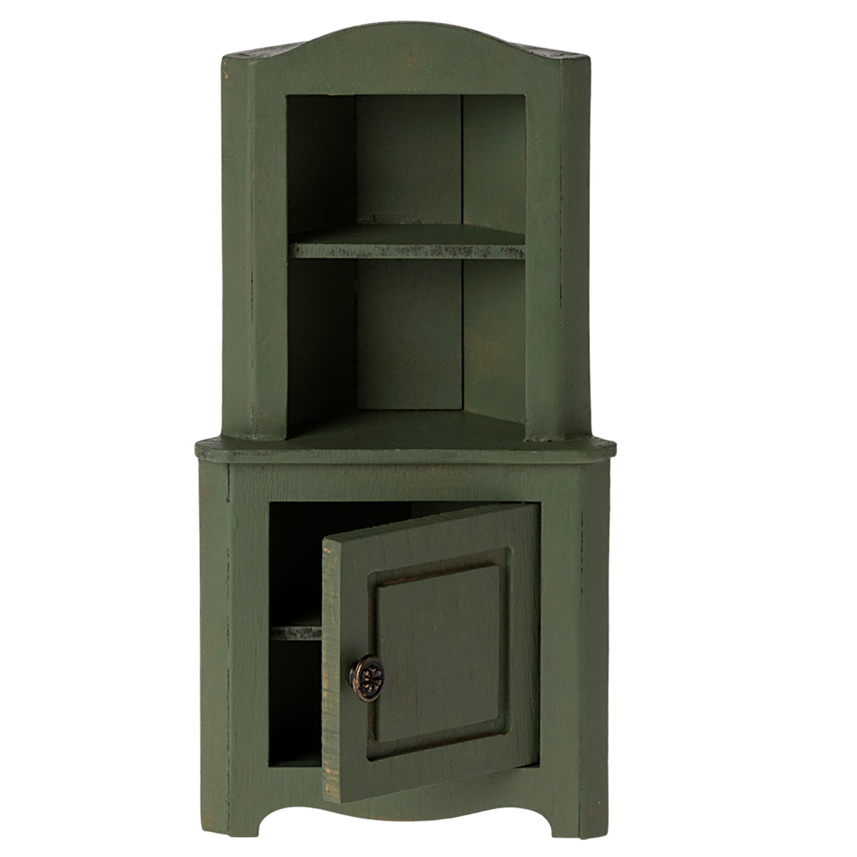 Green wooden corner miniature cabinet with an open lower door. It features two shelves above and a decorative knob. The piece conveys a rustic, vintage charm.