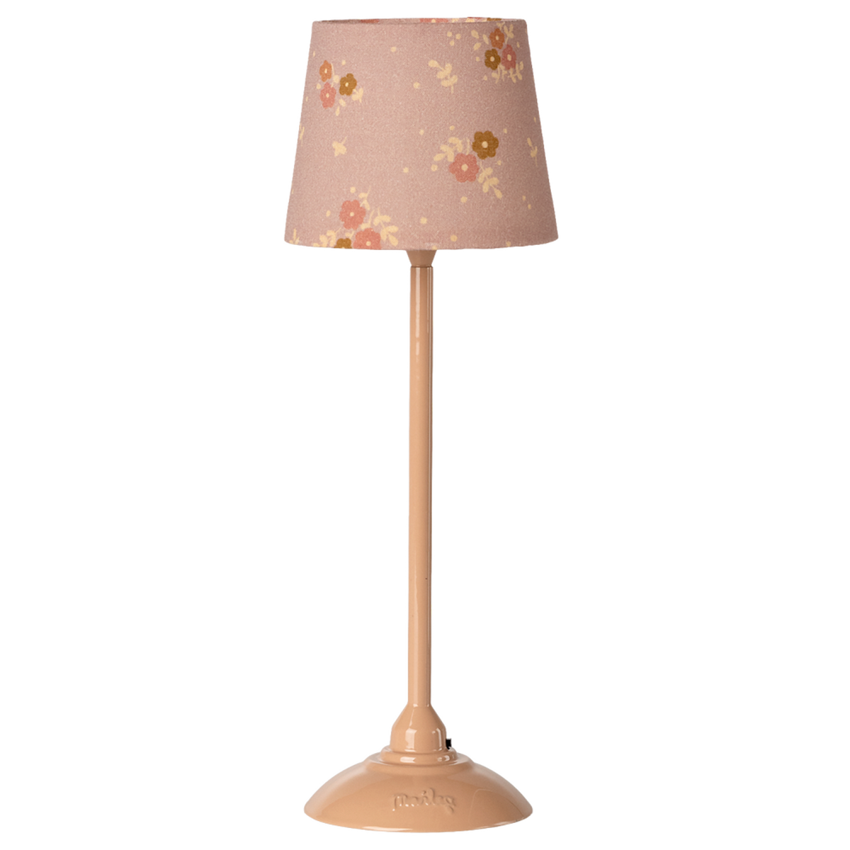 Beige lamp with a floral-patterned shade featuring pink and yellow flowers, set against a white background. The tone is cozy and vintage.