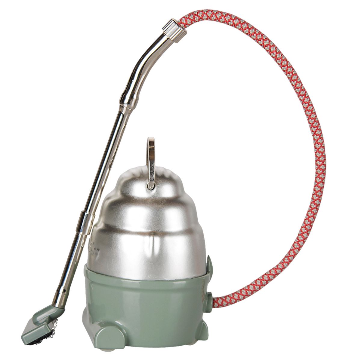 Maileg dollhouse miniature vacuum cleaner toy in dark mint green and silver with a red patterned hose.