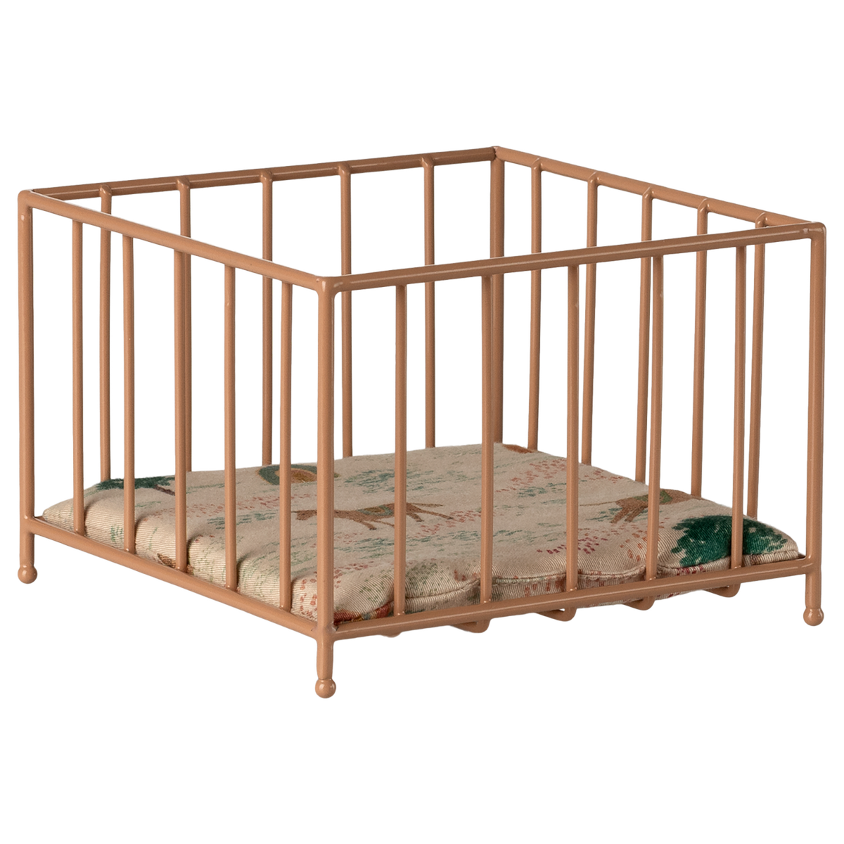 A small, beige metal playpen with vertical bars stands on a white background. Inside is a cushioned mat featuring a subtle floral pattern in green and pink tones.