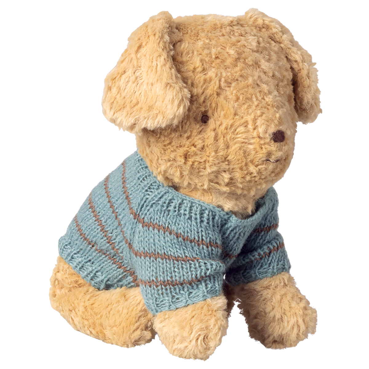 A fluffy, light brown teddy bear wears a blue, knitted sweater with brown stripes. Its expression is calm and endearing, against a white background.