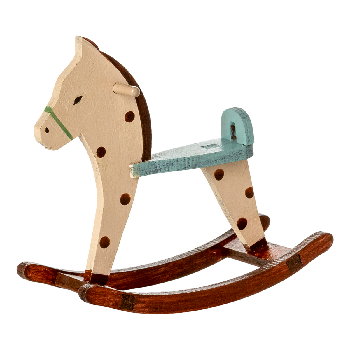 A charming miniature wooden rocking horse with a spotted pattern—sized perfectly for Maileg mice, ideal for dollhouse play and vintage-style nursery scenes.