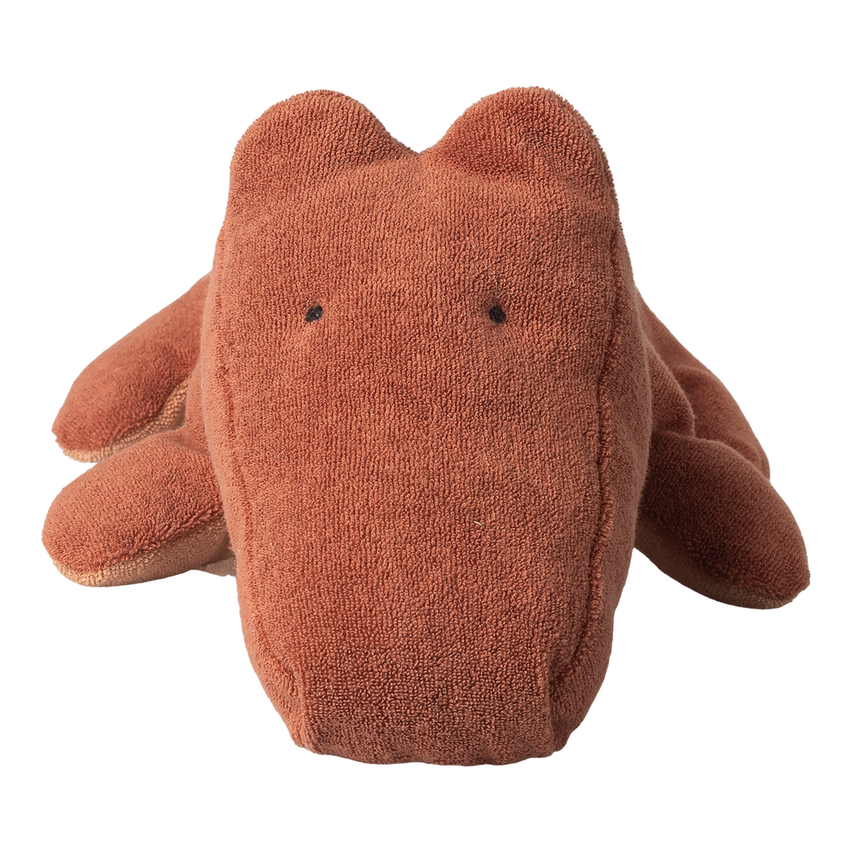 A rust-colored, textured stuffed toy resembling a simplistic animal, likely a bear, on a white background. It has a soft, cuddly appearance.