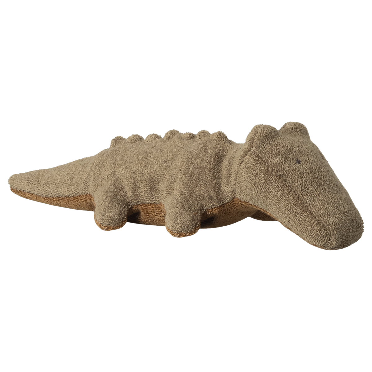 A plush crocodile toy with a beige, textured surface is shown on a white background. Its simple features convey a cozy, playful vibe.