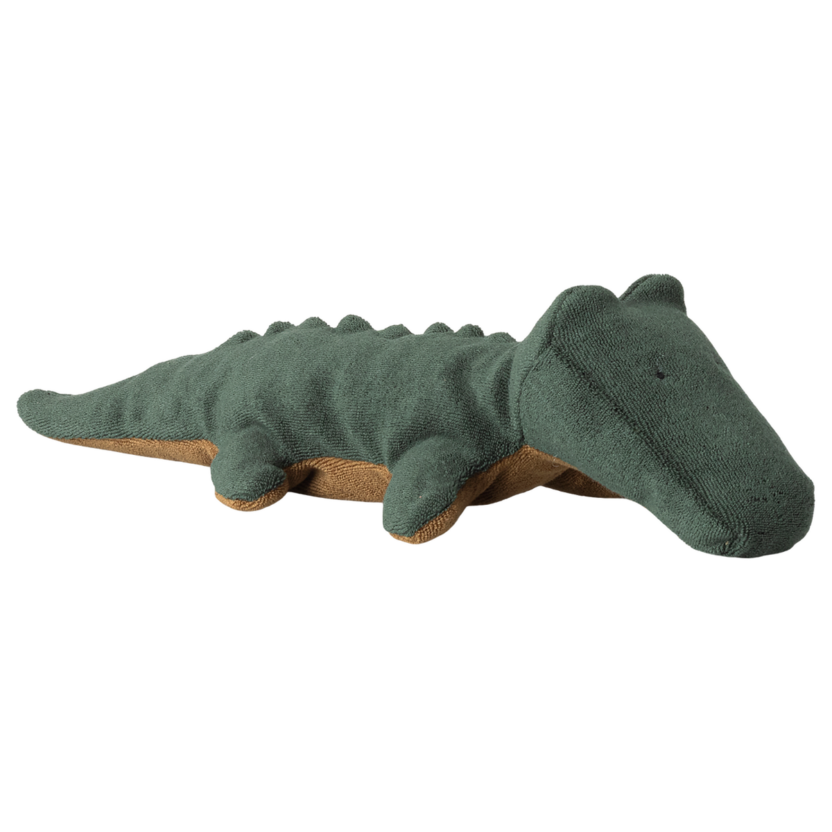 A soft, plush crocodile toy lies against a white background. The toy is dark green with a brown underside, featuring simple, stitched details.