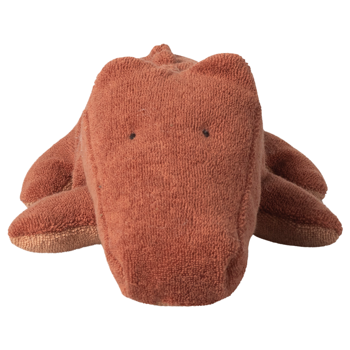 Brown plush crocodile toy with simple black eyes on a plain white background, conveying a cute and cuddly appearance.