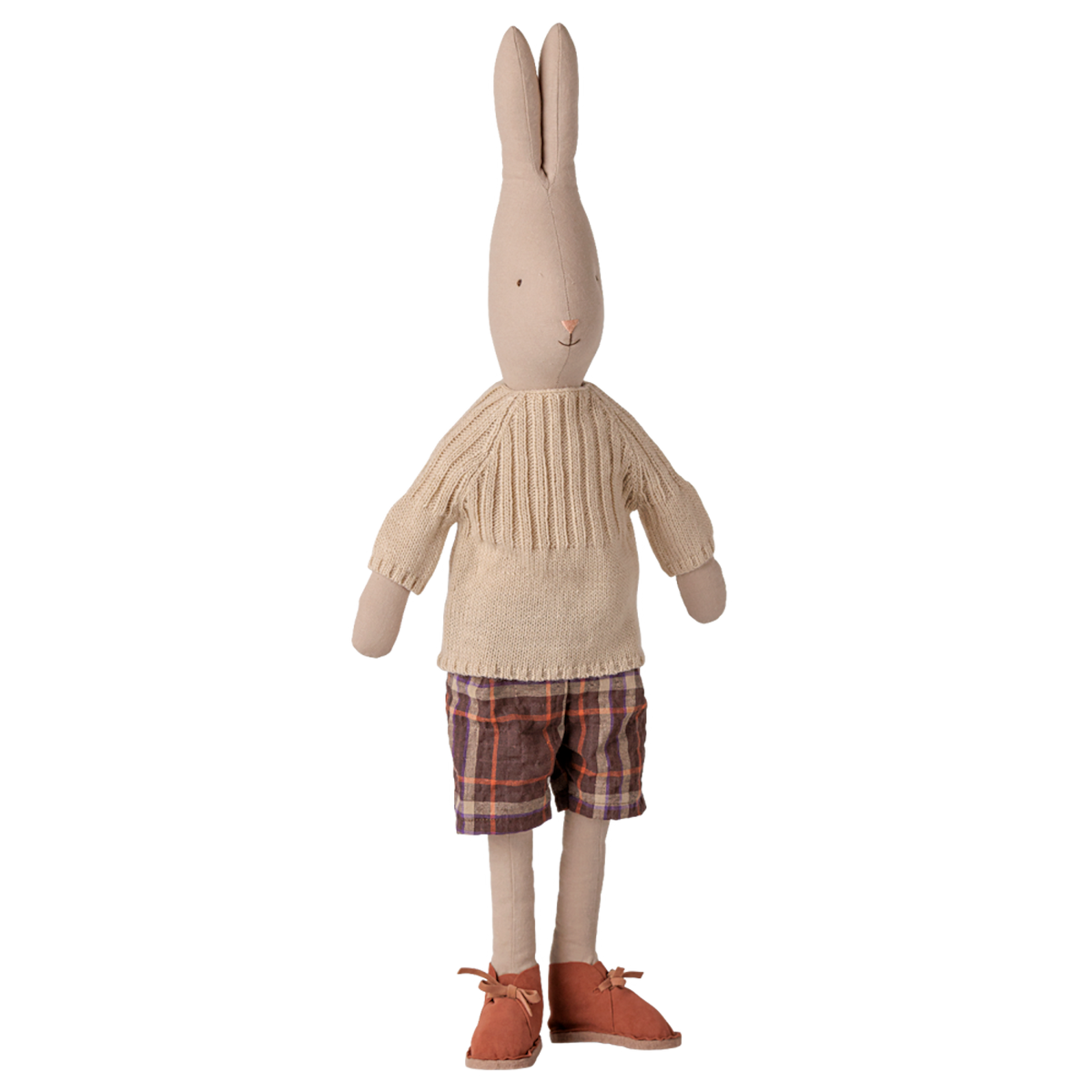 Maileg size 4 bunny doll wearing an off-white knitted sweater, plaid shorts, and brown shoes.