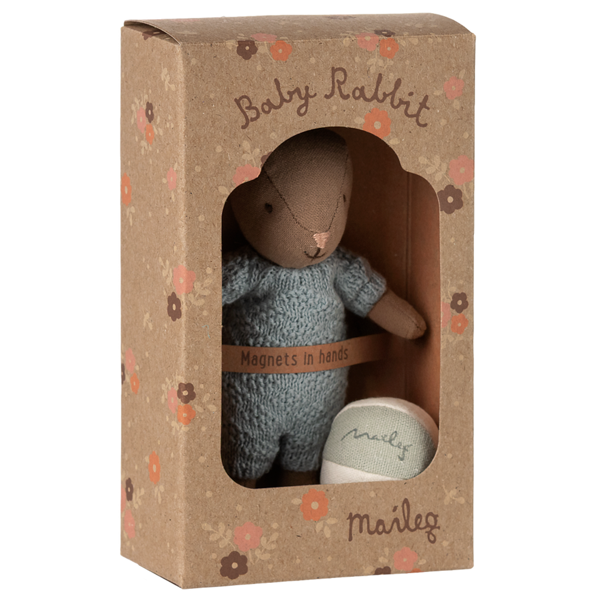 Maileg Baby Rabbit in blue knit suit and floral box. Small brown plush bunny toy with magnets in hands.