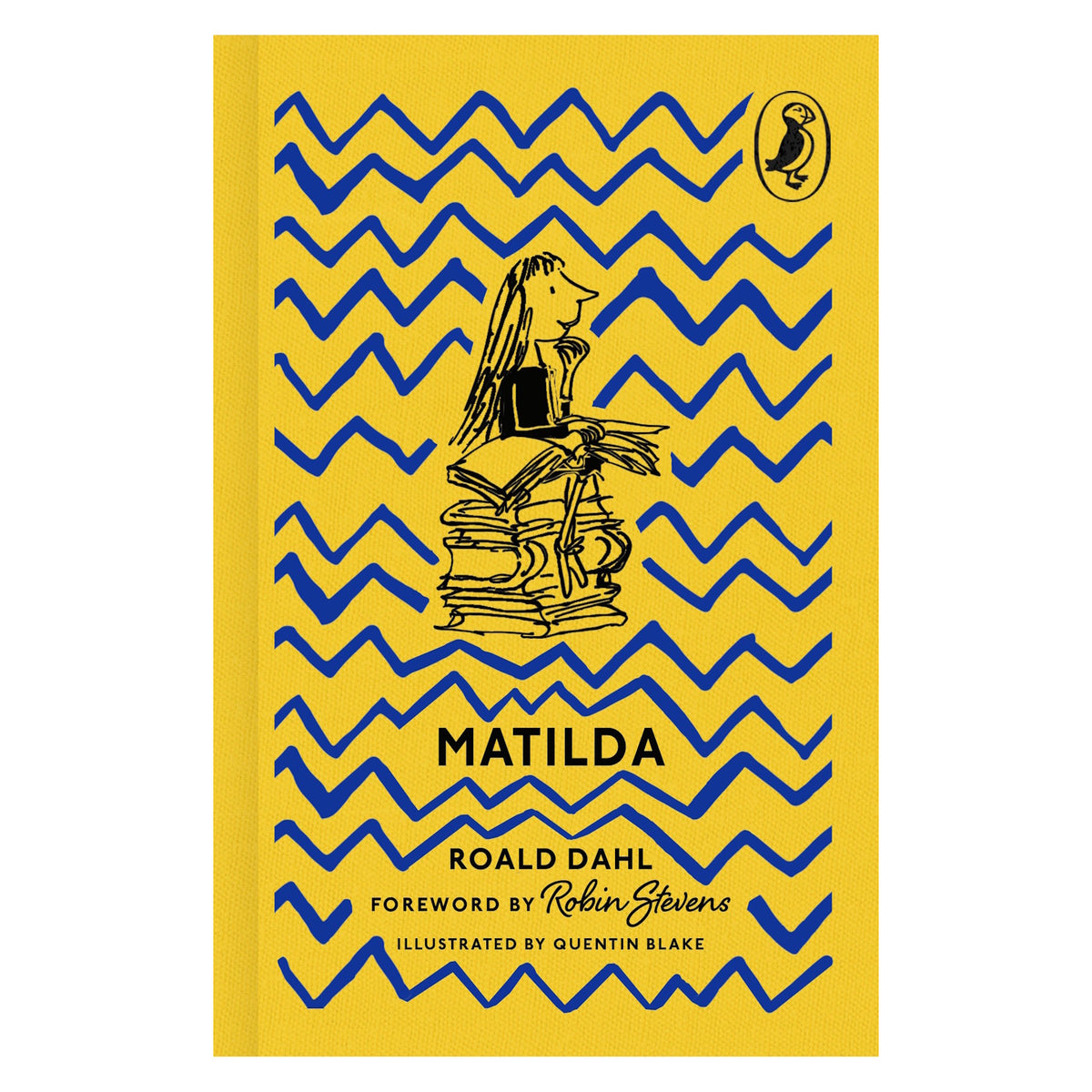 Yellow clothbound book cover of Matilda by Roald Dahl, featuring blue zigzags and a Quentin Blake illustration of Matilda.