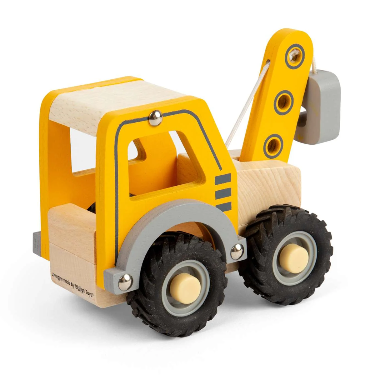 Wooden toy tow truck with bright yellow body, grey accents, and black wheels. Features a movable arm, conveying a playful and sturdy design.
