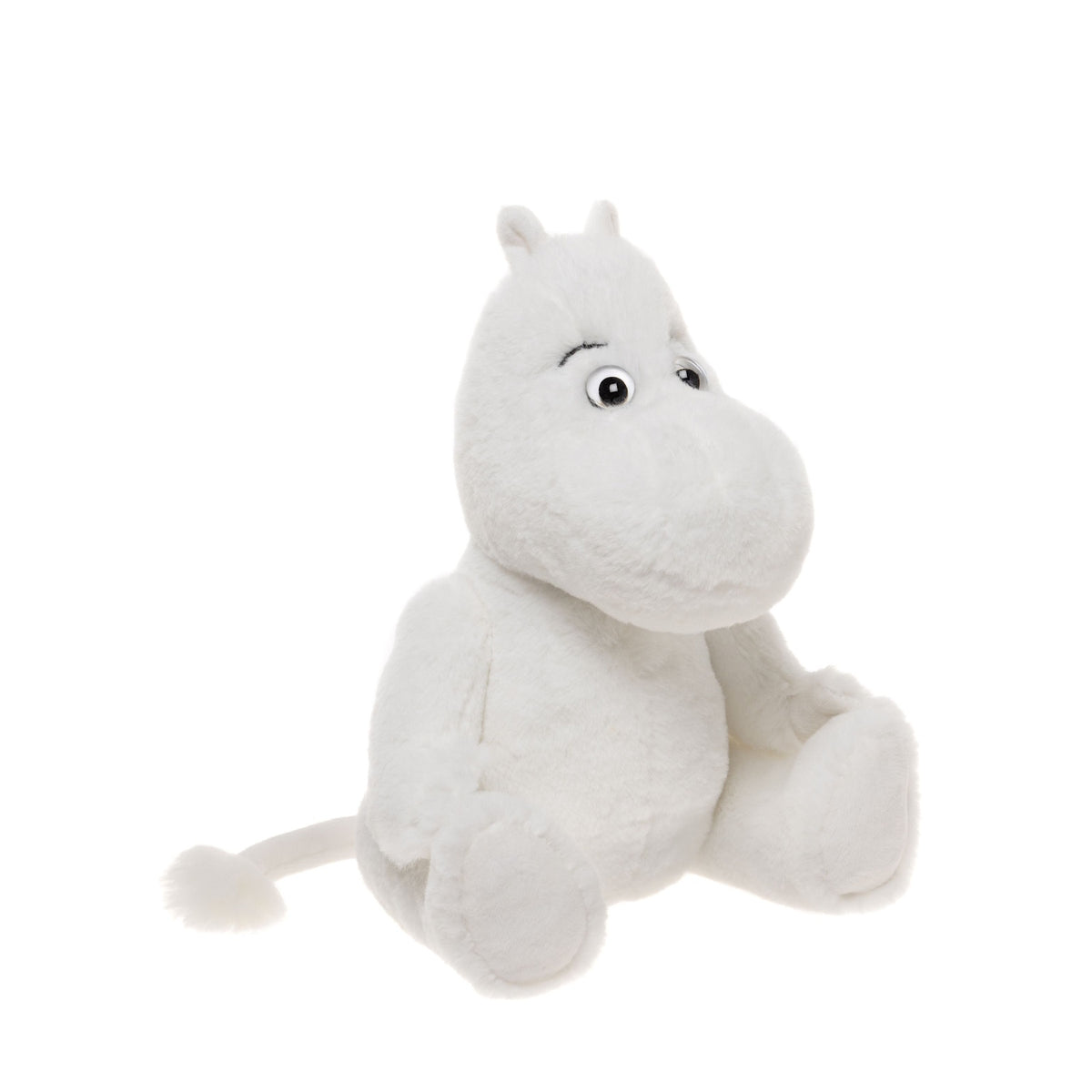 A plush, white, hippo-like toy with large eyes and small ears sits upright against a plain background, conveying a sense of softness and warmth.