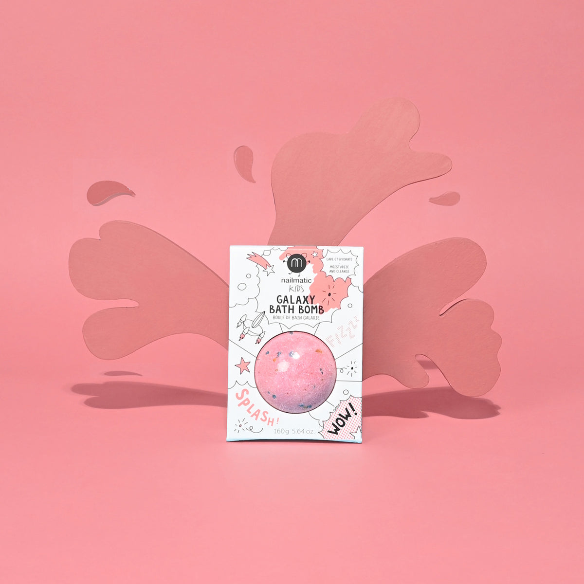 Colorful bath bomb packaging labeled "Galaxy Bath Bomb" against a pink background, featuring playful splash illustrations and an excited, fun vibe.