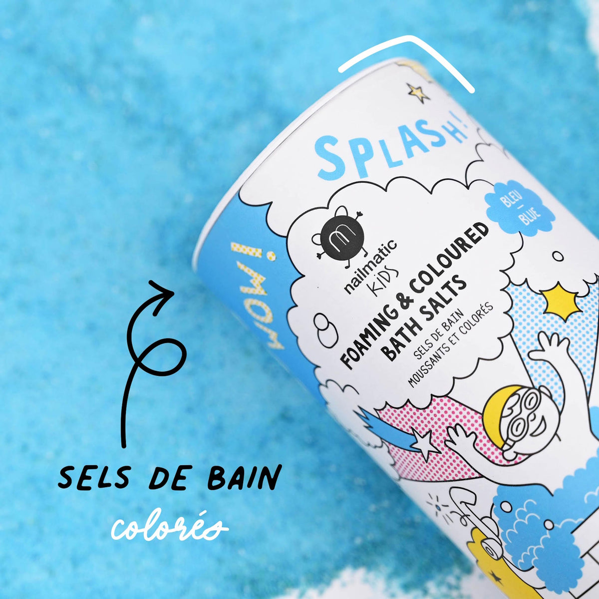 A colorful canister of bath salts features playful illustrations and the words "Foaming & Coloured Bath Salts." The background shows vibrant blue salts.