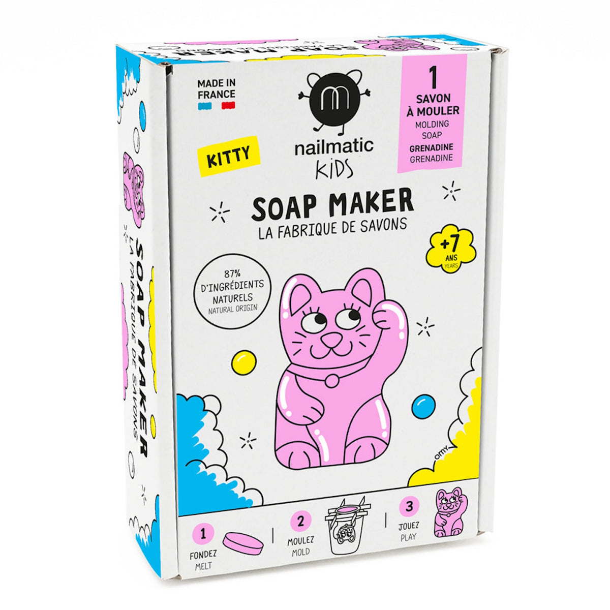 Box of Nailmatic Kids Soap Maker Kit with a playful pink kitten illustration. Contains molding soap, labeled for ages 7+, made in France. Bright, fun design.