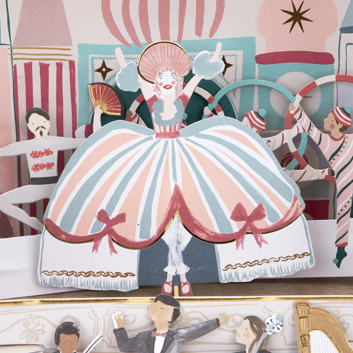 Close-up of Nutcracker theatre advent calendar featuring a ballerina paper puppet on stage.