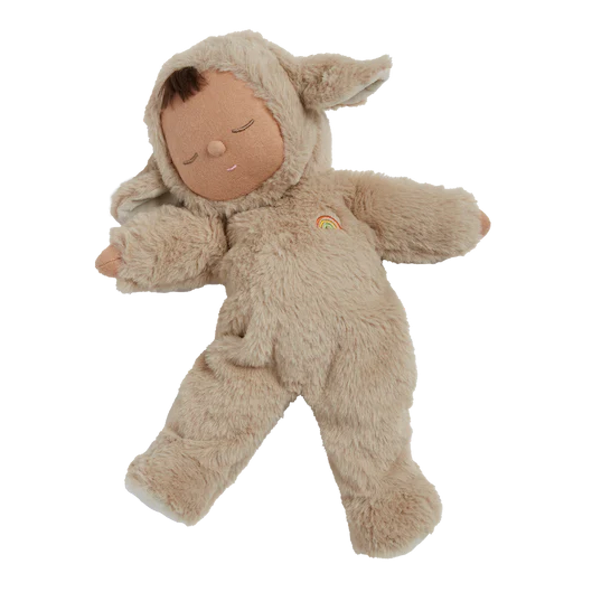 Cute doll in a fluffy beige sheep costume with floppy ears and a serene face. The doll wears a small embroidered rainbow, conveying calmness.