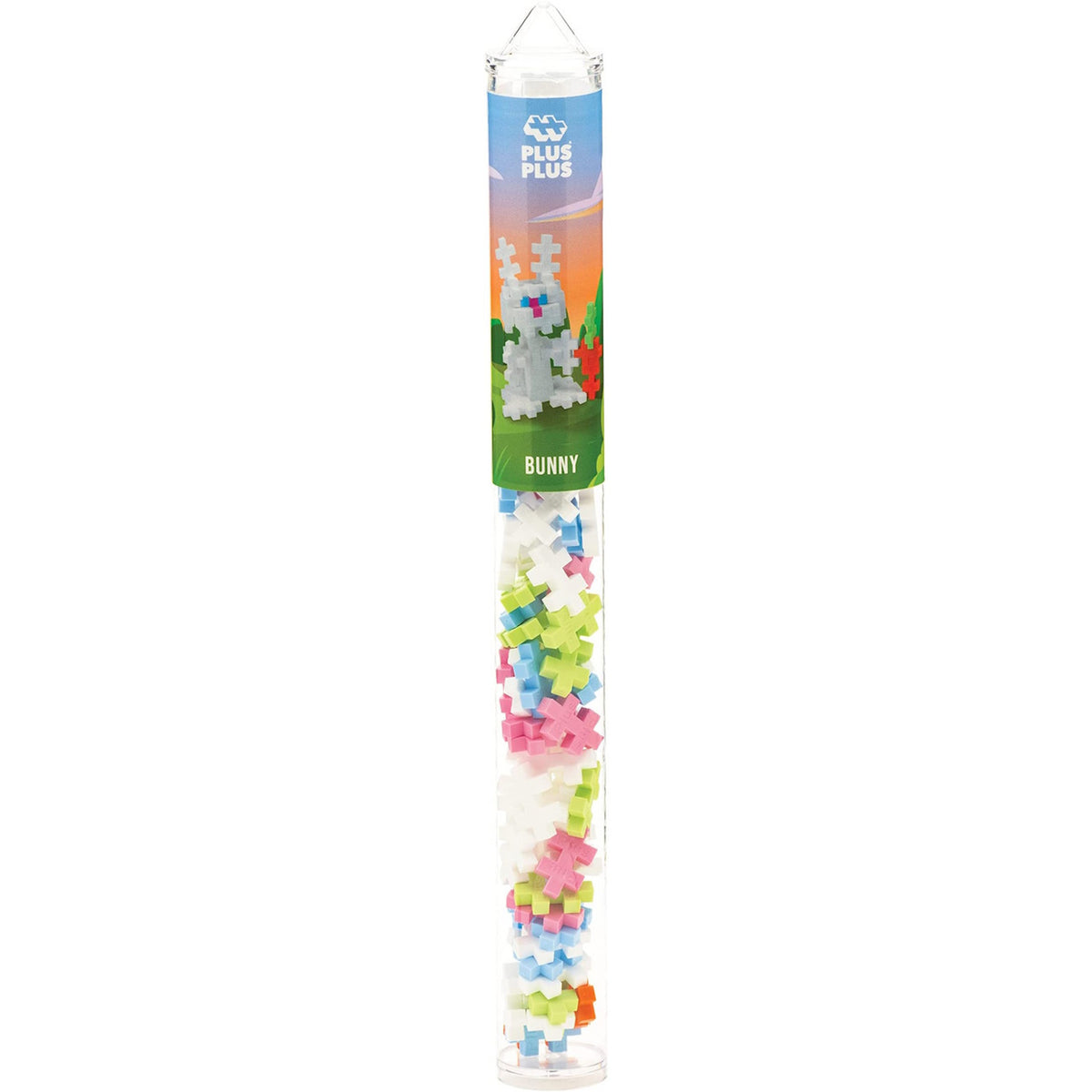 Transparent tube containing colorful Plus-Plus building pieces with a bunny design label at the top. Pieces are pink, blue, green, and white.