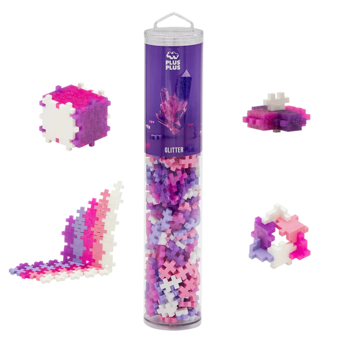Tube of Plus-Plus glitter building blocks with pink, purple, and white pieces arranged in various shapes, set against a white background.