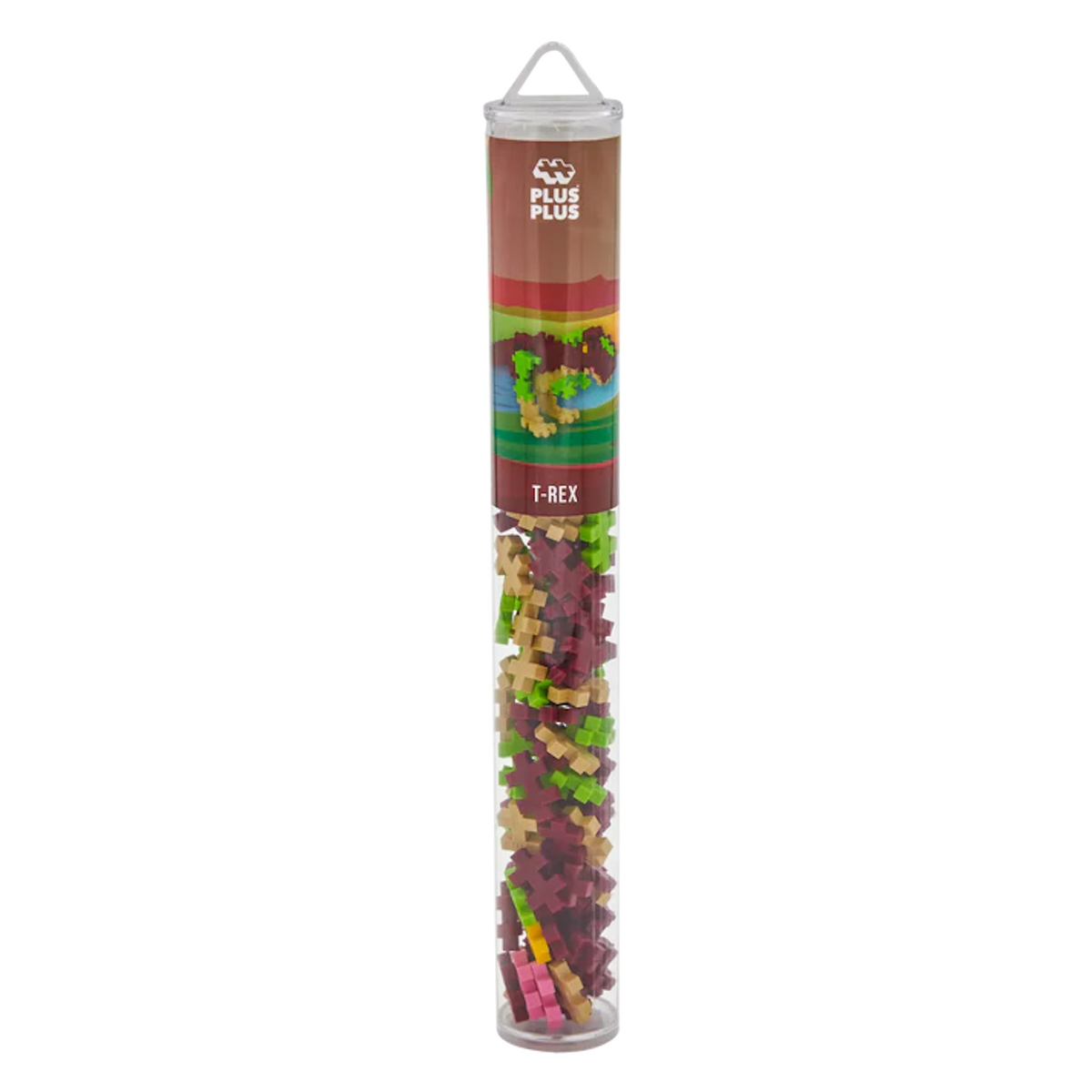 A tall, transparent tube labeled "Plus Plus T-Rex" contains colorful interlocking building blocks in shades of red, green, and beige, set against a white background.
