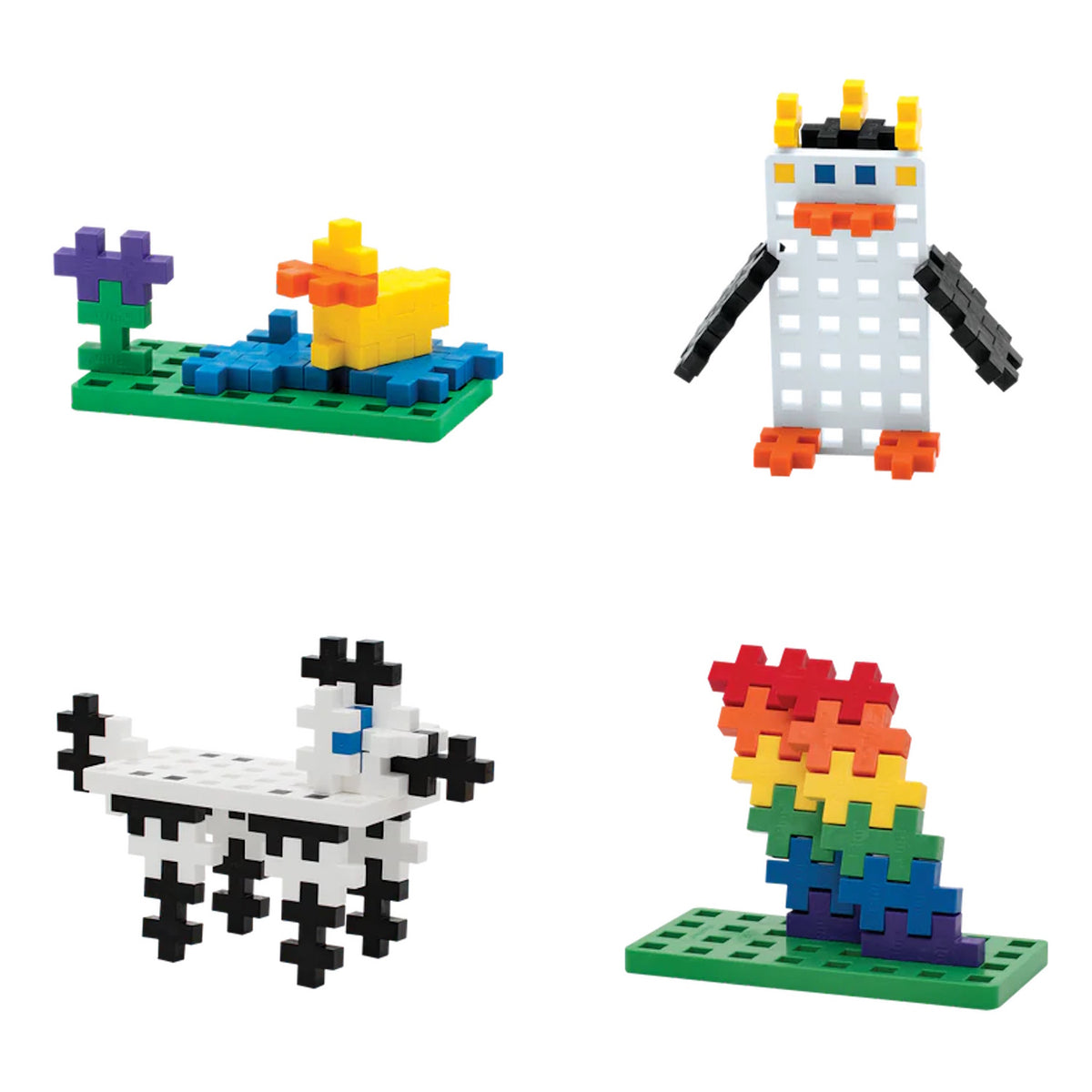 Four Plus-Plus block creations: a duck on a pond, a penguin, a spotted dog, and a rainbow stack on green baseplates.