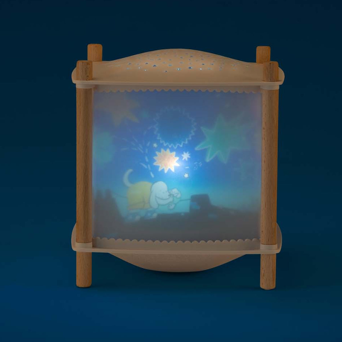 Moulin Roty magic lantern night light with dog and stars projection for nursery.