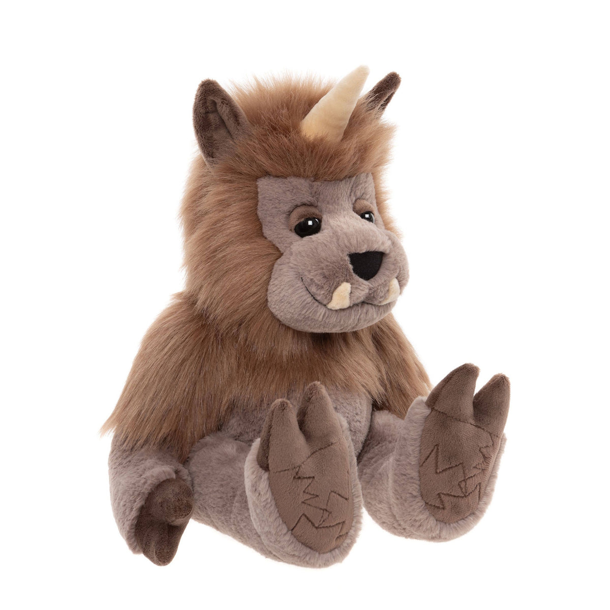 A sitting brown plush ogre monster with a single horn on its head, small tusks, and large hooved feet.