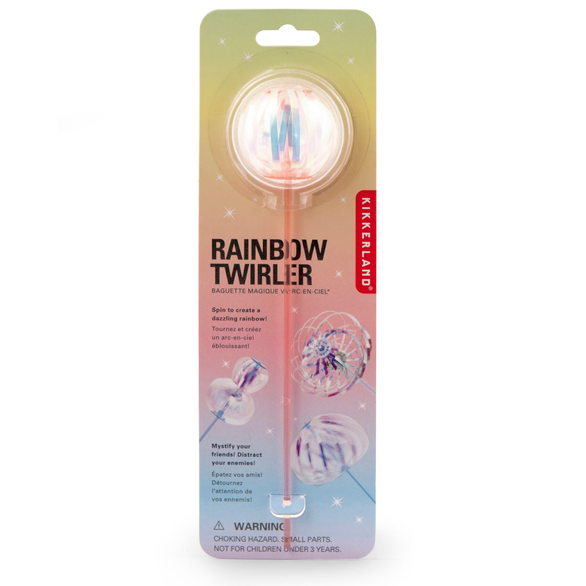 Packaging of Kikkerland's Rainbow Twirler toy. A clear ball on a stick with colorful spiral patterns, set against a pastel starry background.