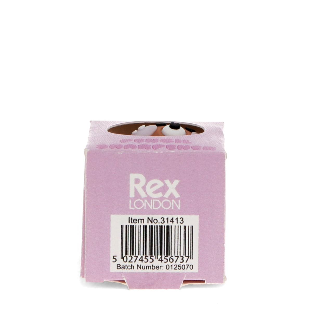 Pink box with "Rex London" branding, item number, and barcode. A cartoon dog's eyes peek out from the top, adding a playful touch.
